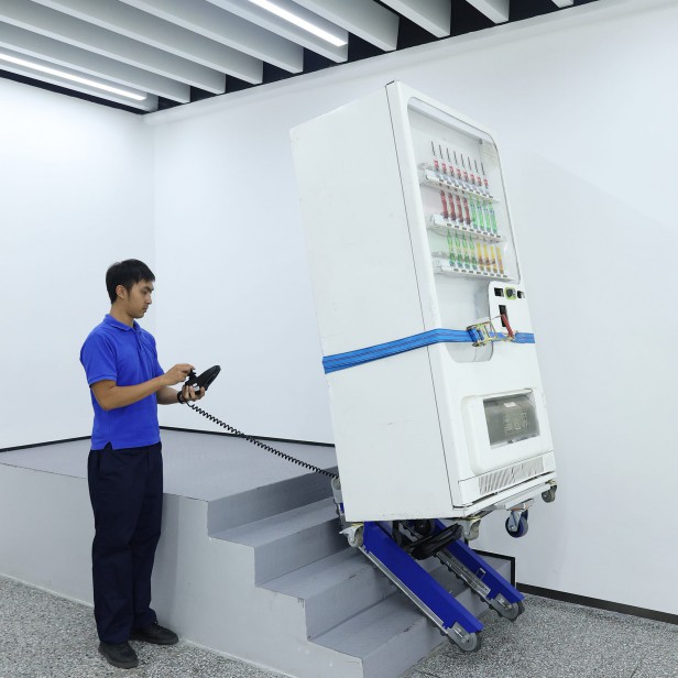 XSTO CT310 Electric stair climbing trolley, Load capacity up to 310 kg, Self-adjusting loading plate, Joystick control, Automatic tilt platform, IP54 protection, Low noise <70 dB, Professional moving equipment