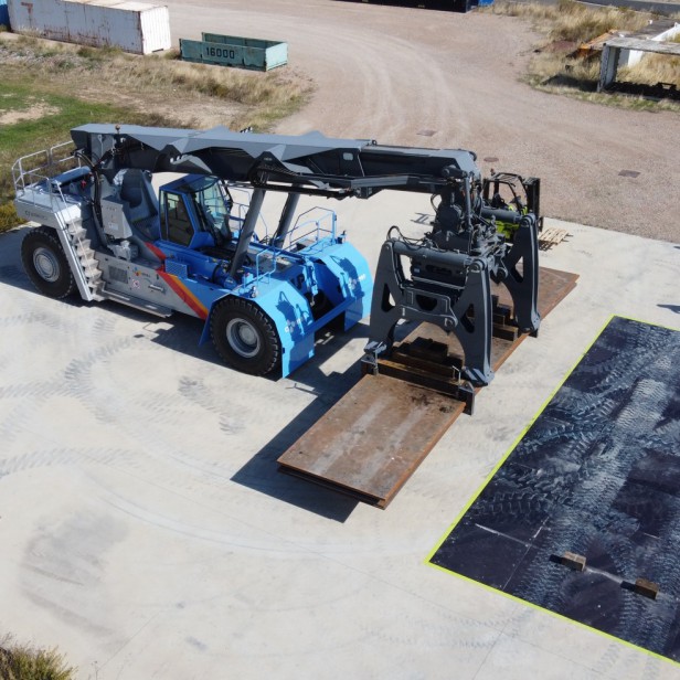  Reach stacker Model RSUP-100-75-SHR specially designed for handling slabs from the rolling mill up to 110 ton 