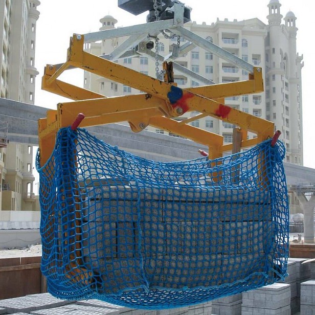 Probst Scissor Grab SG on construction site Probst SG lifting unordered slabs Probst SG transporting blocks without pallet Probst SG in use with paving stones