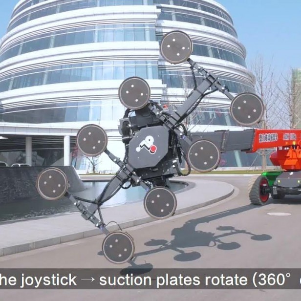 Electric articulated self-propelled glass lift Dingli BT2615ERTGS  Dingli BT2615ERTGS in operation  Glass lift for panel installation  Electric lift for heavy glass materials  Dingli BT2615ERTGS on construction site