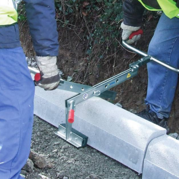 Probst Universal Handle BVZ on construction site Probst BVZ handle in use Probst BVZ lifting kerbs and blocks Probst BVZ in application on pavement