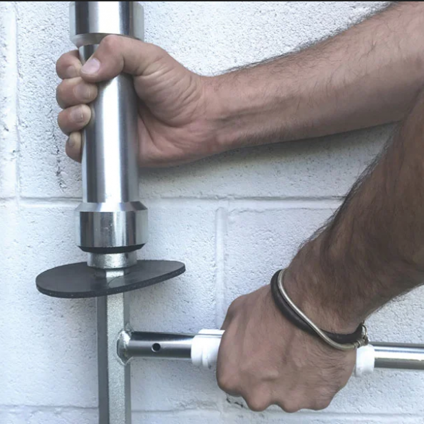 ITALIFTERS MZ120 impact tool ITALIFTERS MZ120 manhole cover lifter in use Impact tool MZ120 for jammed manhole covers