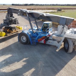 Reach stacker Model RSUP-100-75-SHR specially designed for handling slabs from the rolling mill up to 110 ton! Reach stacker Model RSUP-100-75-SHR specially designed for handling slabs from the rolling mill up to 110 ton!